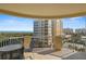 Charming balcony offering panoramic views of the ocean and neighboring condo buildings at 261 Minorca Beach Way # 606, New Smyrna Beach, FL 32169
