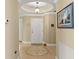 Welcoming foyer with decorative tile flooring, recessed lighting, and elegant details at 261 Minorca Beach Way # 606, New Smyrna Beach, FL 32169