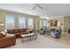 Bright and spacious living room featuring comfortable seating and ample natural light at 261 Minorca Beach Way # 606, New Smyrna Beach, FL 32169