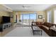 Cozy living room with scenic views, perfect for relaxation and enjoying the coastal lifestyle at 261 Minorca Beach Way # 606, New Smyrna Beach, FL 32169