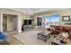 Inviting living room with large windows and sliding doors, offering stunning views of the ocean at 261 Minorca Beach Way # 606, New Smyrna Beach, FL 32169