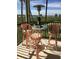Screened balcony seating area with heater and marina views at 2700 N Peninsula Ave # 113, New Smyrna Beach, FL 32169