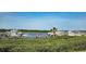 Enjoy the beautiful view of this dock with boats and water at 2700 N Peninsula Ave # 113, New Smyrna Beach, FL 32169