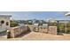 Outdoor kitchen with built-in grills and brick surround, ideal for hosting outdoor cookouts and gatherings at 2700 N Peninsula Ave # 113, New Smyrna Beach, FL 32169
