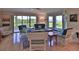 Bright and spacious living room with comfortable seating and water views at 2700 N Peninsula Ave # 113, New Smyrna Beach, FL 32169