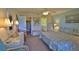 Bright and airy main bedroom, ample closet space, and an en-suite bathroom for added convenience at 2700 N Peninsula Ave # 113, New Smyrna Beach, FL 32169