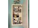 Open medicine cabinet showcasing ample storage space for toiletries and personal care items at 2700 N Peninsula Ave # 113, New Smyrna Beach, FL 32169