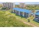 Aerial view of condo complex offering stunning water views and coastal living at 2700 N Peninsula Ave # 513, New Smyrna Beach, FL 32169