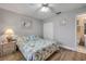 Cozy bedroom with wood floors, ceiling fan, and ample closet space at 2700 N Peninsula Ave # 513, New Smyrna Beach, FL 32169