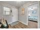 Entryway leading to the bedroom, featuring wood floors and natural light at 2700 N Peninsula Ave # 513, New Smyrna Beach, FL 32169