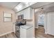 Kitchen includes modern stainless steel appliances and neutral countertops at 2700 N Peninsula Ave # 513, New Smyrna Beach, FL 32169
