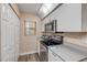 Kitchen includes modern stainless steel appliances and neutral countertops at 2700 N Peninsula Ave # 513, New Smyrna Beach, FL 32169