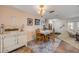 Inviting dining area featuring tile flooring, a chandelier, and ample space for Gathering gatherings at 2828 Pine Tree Dr, Edgewater, FL 32141