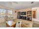 Spacious living room offering ample seating, natural light, and a comfortable atmosphere at 2828 Pine Tree Dr, Edgewater, FL 32141