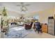 Inviting sunroom with large windows, creating a perfect space for relaxation and plants at 2828 Pine Tree Dr, Edgewater, FL 32141