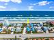 Aerial view of beachfront homes with ocean views and direct beach access at 2901 Hill St, New Smyrna Beach, FL 32169