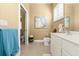 Bathroom features a vanity with double sinks and tile flooring at 2901 Hill St, New Smyrna Beach, FL 32169