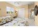 Bright bedroom with twin beds and closet at 2901 Hill St, New Smyrna Beach, FL 32169