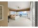 Bright main bedroom with sliding doors offering ocean views and access to a private balcony at 2901 Hill St, New Smyrna Beach, FL 32169