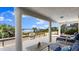 Relaxing covered patio with ample seating overlooking the beach and ocean view at 2901 Hill St, New Smyrna Beach, FL 32169