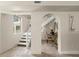 Bright staircase with natural light, modern design, and easy access to the upper floors at 2901 Hill St, New Smyrna Beach, FL 32169