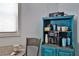 Charming coffee bar nook with an array of mugs, coffee maker, and whimsical decorations at 303 Washington St, New Smyrna Beach, FL 32168