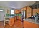 Well-equipped kitchen with stainless steel appliances, ample cabinet space, and a breakfast bar at 303 Washington St, New Smyrna Beach, FL 32168