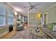 Inviting living room with hardwood floors, a glass coffee table, and stylish decor at 303 Washington St, New Smyrna Beach, FL 32168