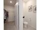 Bathroom featuring a closet and vanity with framed artwork at 3245 Carpentaria Dr, New Smyrna Beach, FL 32168