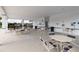 A covered poolside patio providing ample seating and shade for residents to gather by the community pool at 3245 Carpentaria Dr, New Smyrna Beach, FL 32168