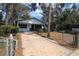 View of the front yard featuring a well-manicured lawn and a glimpse of the house at 349 Fletcher Ave, Daytona Beach, FL 32114