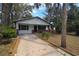 Charming single-story home with a well-kept lawn and welcoming front porch at 349 Fletcher Ave, Daytona Beach, FL 32114