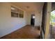 A view of screened in patio with tile flooring and access to the home's interior at 349 Fletcher Ave, Daytona Beach, FL 32114