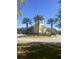 Clock tower on landscaped traffic circle at 3611 Marisol Ct, New Smyrna Beach, FL 32168