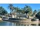 Elegant entrance to Venetian Bay, complete with stone accents, fountains, and a serene lake, creating a grand welcome at 3611 Marisol Ct, New Smyrna Beach, FL 32168