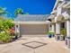 Attached two-car garage with a beautiful driveway and well-kept landscaping at 3611 Marisol Ct, New Smyrna Beach, FL 32168