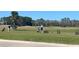 Golf course with people practicing at 3611 Marisol Ct, New Smyrna Beach, FL 32168