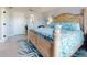Bright main bedroom with en suite access and views to the exterior at 3611 Marisol Ct, New Smyrna Beach, FL 32168