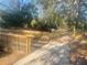 Explore the scenic walking trail, featuring a wooden bridge amidst lush greenery and natural surroundings at 3611 Marisol Ct, New Smyrna Beach, FL 32168