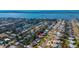 Scenic aerial view of the property with mature trees, nearby homes, and waterway at 38 Seacrest Dr, Ormond Beach, FL 32176