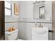 Cozy bathroom with vanity, mirror, and toilet, accented by tile and neutral décor at 38 Seacrest Dr, Ormond Beach, FL 32176