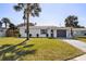 Charming single-story home with a well-manicured lawn and inviting curb appeal at 38 Seacrest Dr, Ormond Beach, FL 32176