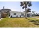 Well-kept single story home with a large manicured lawn and tidy landscaping at 38 Seacrest Dr, Ormond Beach, FL 32176