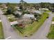 An aerial shot of a home with manicured lawn and shade trees, set in a peaceful residential area at 403 Wildwood Dr, Edgewater, FL 32132