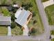 Aerial view of property featuring a well-maintained home with landscaping and mature trees at 403 Wildwood Dr, Edgewater, FL 32132