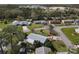 Aerial view of the neighborhood featuring well-kept homes, mature trees, and green lawns at 403 Wildwood Dr, Edgewater, FL 32132