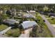 An aerial view of a single Gathering residence in a lush residential neighborhood at 403 Wildwood Dr, Edgewater, FL 32132