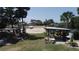 Community outdoor recreational area with storage for kayaks and paddleboards, perfect for waterfront living and outdoor fun at 407 Bouchelle Dr # 205, New Smyrna Beach, FL 32169