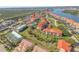 Picturesque waterfront community with lush greenery, a sparkling pool, and gorgeous water views at 407 Bouchelle Dr # 205, New Smyrna Beach, FL 32169