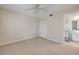 Bedroom leading to a bathroom, offering privacy and convenience at 407 Bouchelle Dr # 205, New Smyrna Beach, FL 32169